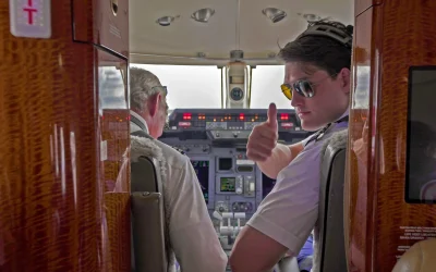 Air Medical Transport flight crew giving a thumbs-up before departure